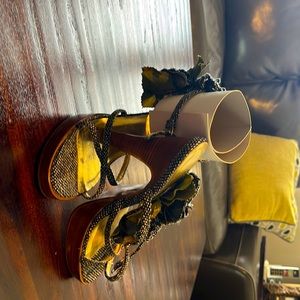 Shoes by Colin Stuart black, white and gold. Still good condition.